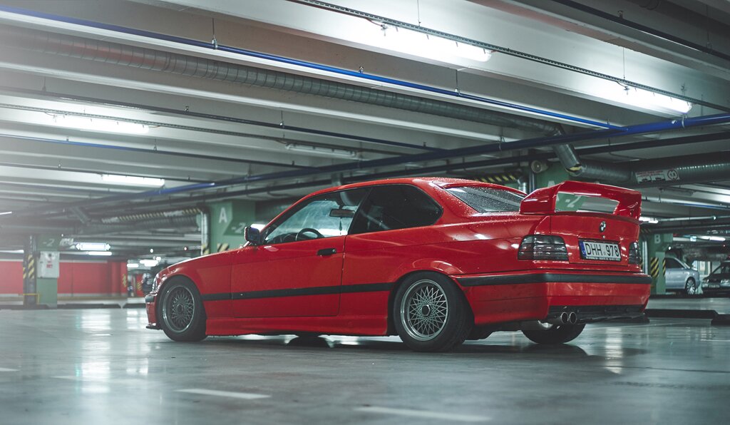 Stanced Red BMW E36 mtech on R15 mesh